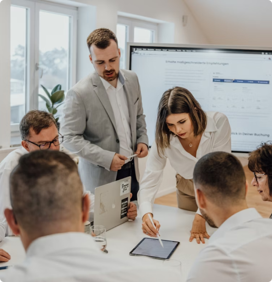Professional business team collaborating in a meeting with presentation and discussion